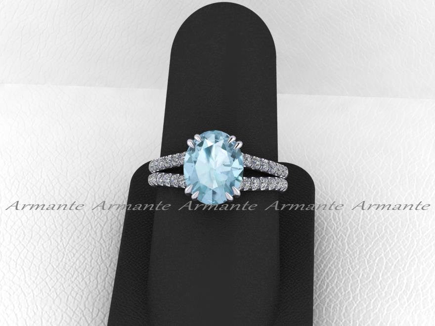 Oval Cut Aquamarine and Diamond Engagement Ring